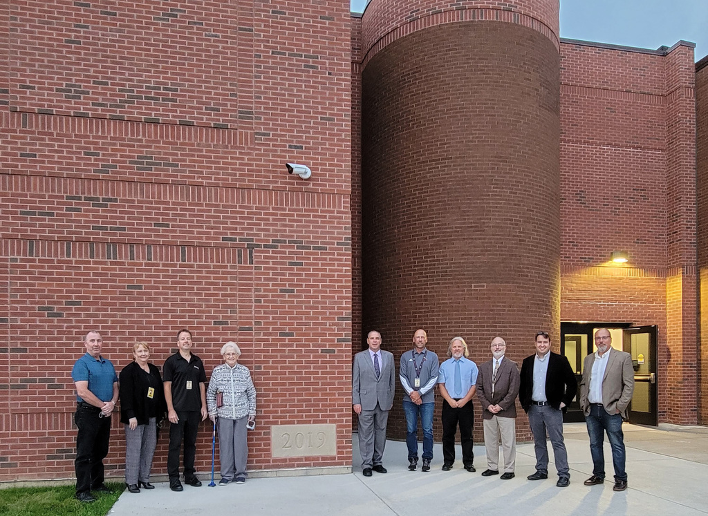 Board of Education members and professionals involved in the Capital Project stand outside Silver Creek Elementary.