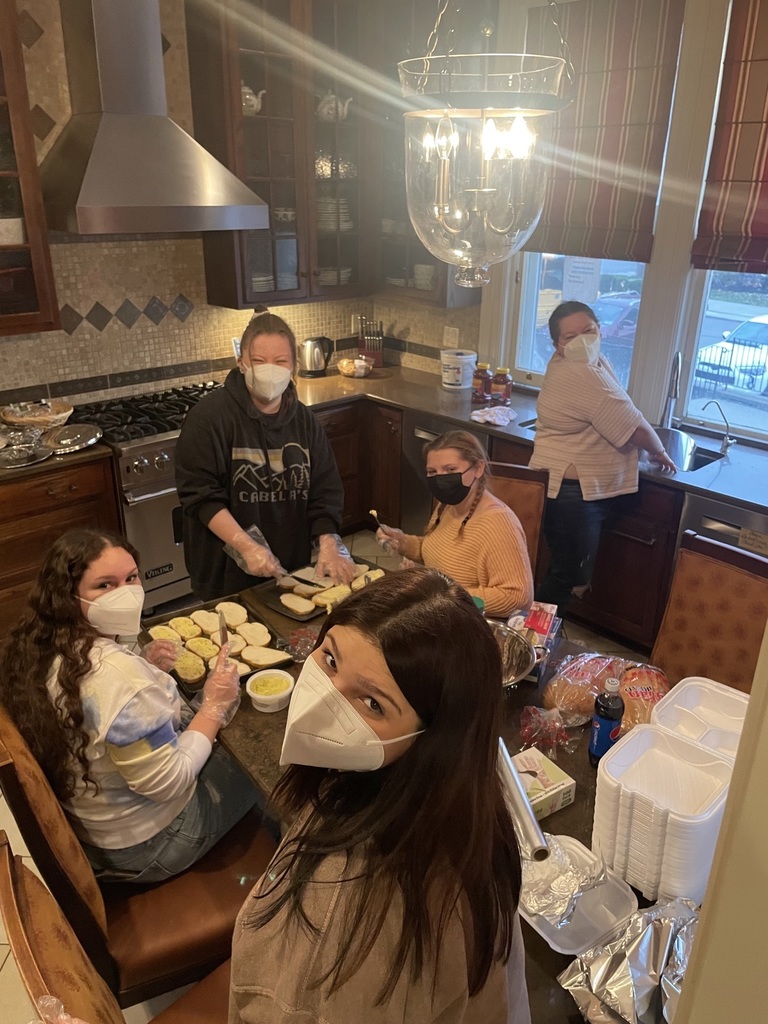 KAC members in the kitchen at Kevin Guest House 