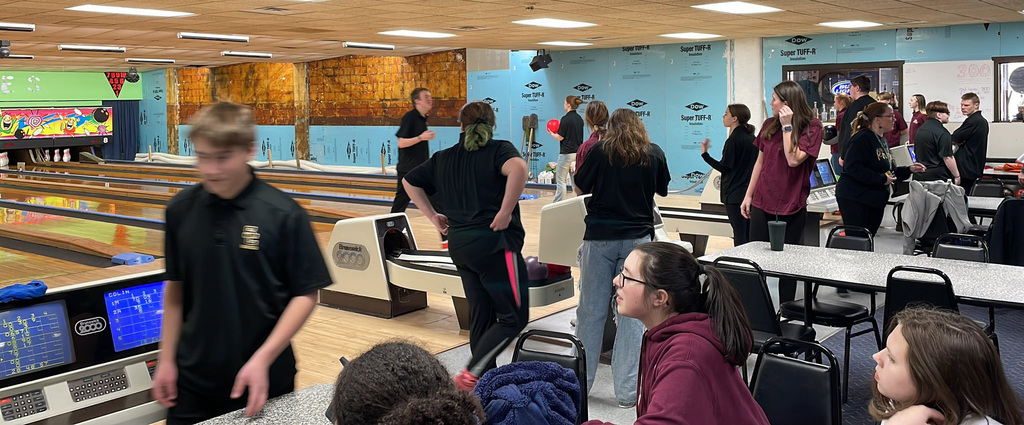 Silver Creek and Eden bowlers mill around a bowing alley on Jan. 31, 2023. 