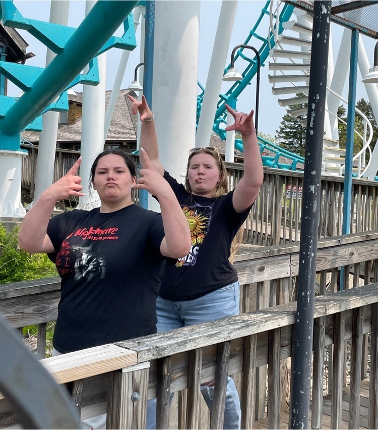 more students board roller coaster 